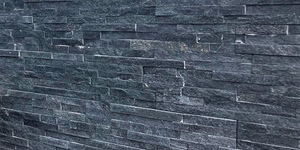 Цоколь облицованный 3D панелями из натурального камня Кварцит Black Quartz Classic от бренда RKS SLATE фото готового дома смотреть (6)
